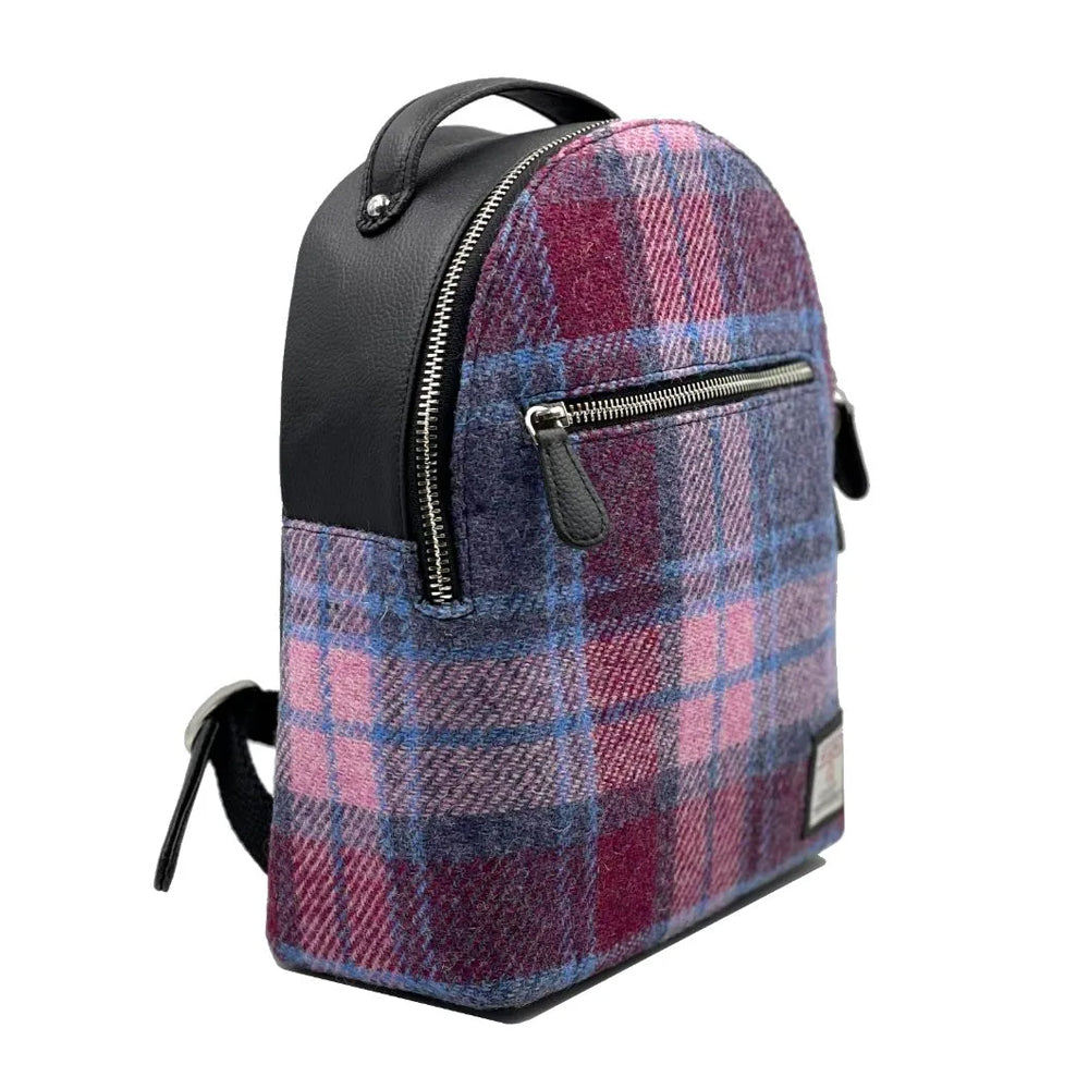 Harris tweed backpack with a checked pattern of pinks, purples, and blues.