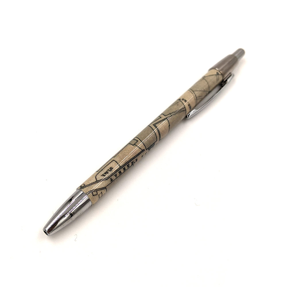A pen with an old map of Edinburgh showing Burke of Burke and Hare's House against a white background.