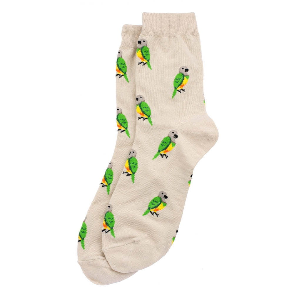 A pair of beige socks with a repeating pattern of green and yellow parrots.