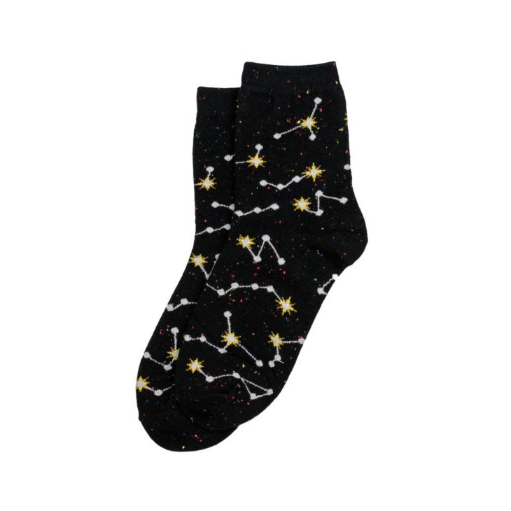 A pair of black socks with a constellation design against a plain white background.
