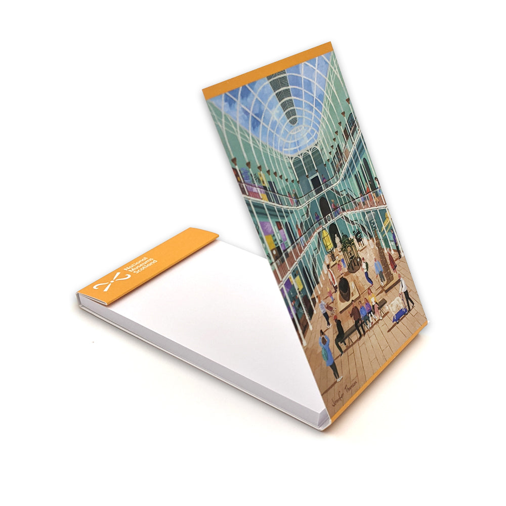 An open folding notebook with a vibrant illustration of The National Museum of Scotland's grand galley by Edinburgh based artist Jennifer Thomson.
