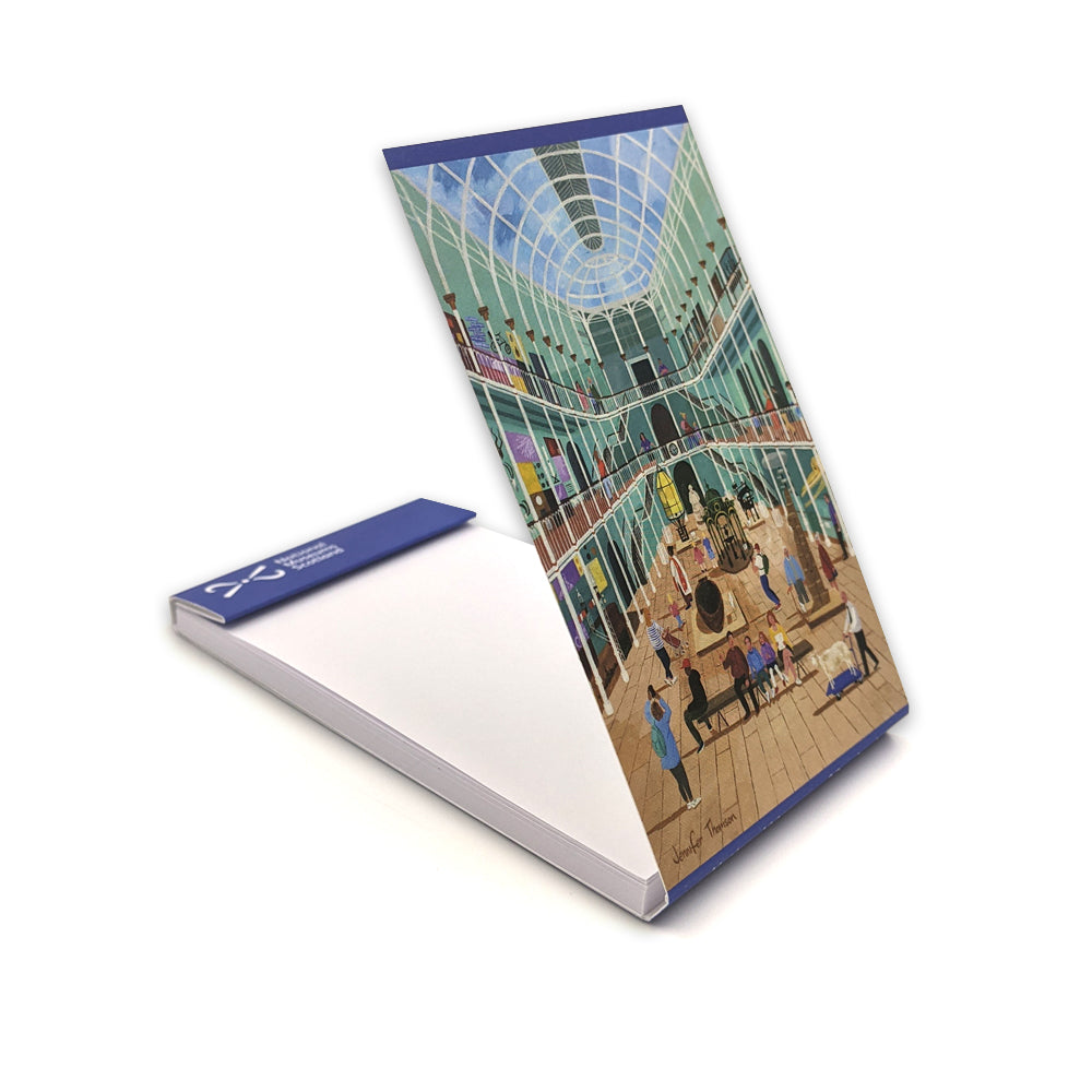 An open folding notebook with a vibrant illustration of The National Museum of Scotland's grand galley by Edinburgh based artist Jennifer Thomson.