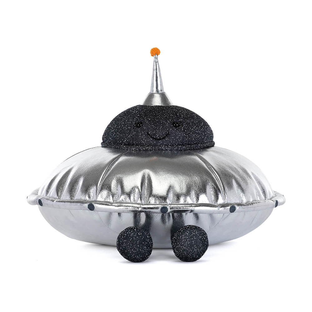 A soft toy of a shiny silver flying saucer with legs and a smiley face against a plain white background.