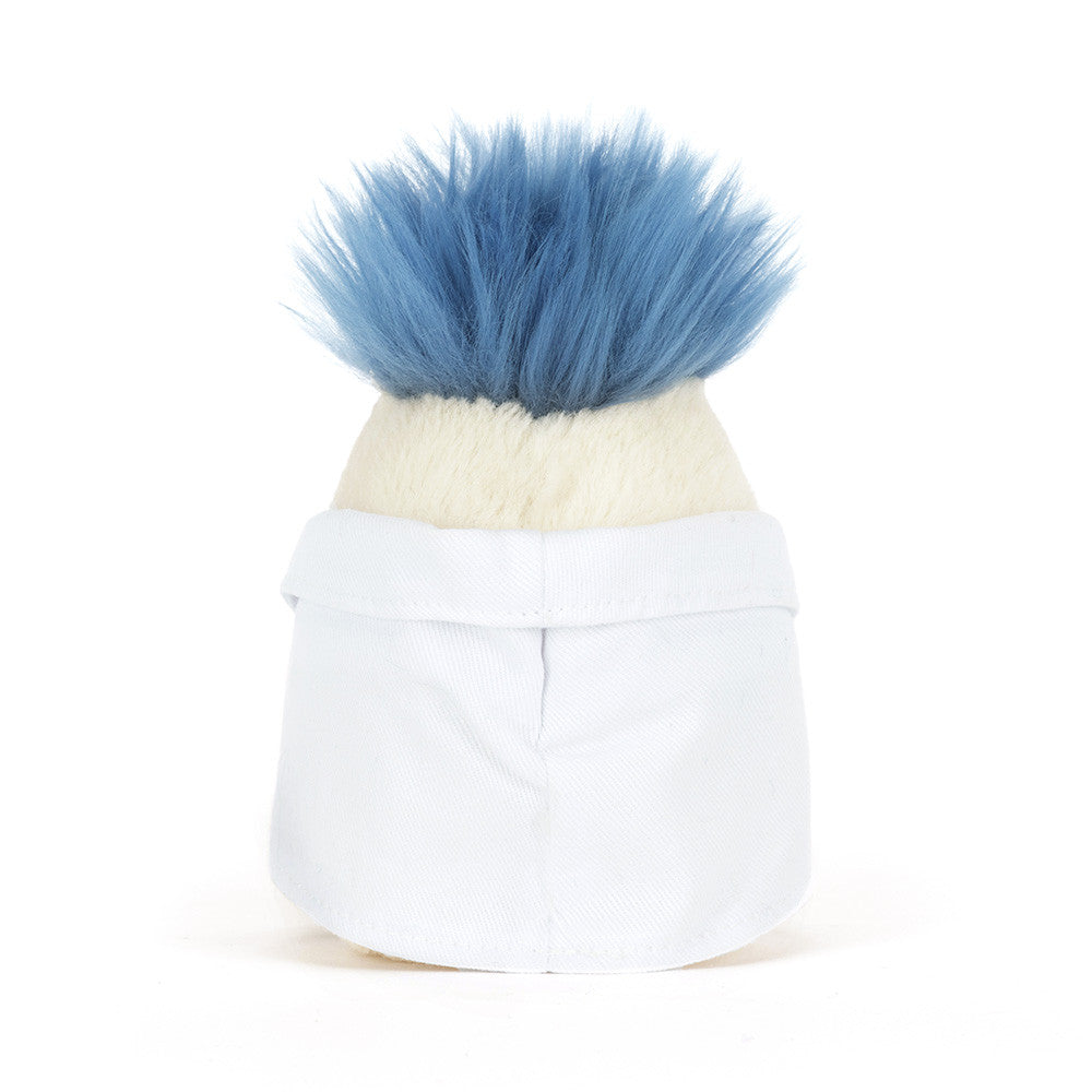 A back view of a stuffed toy resembling a scientist with blue hair, glasses and a white lab coat on a white background