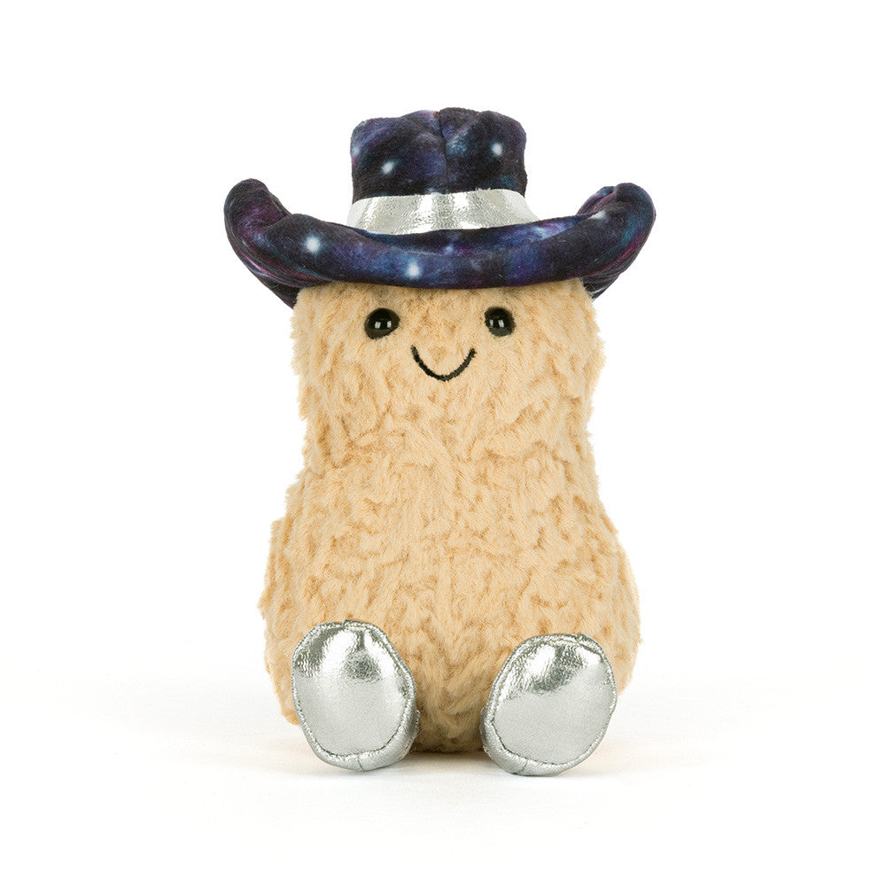 Stuffed toy peanut with a smiling face, a galaxy-patterned hat and silver shoes on a white background