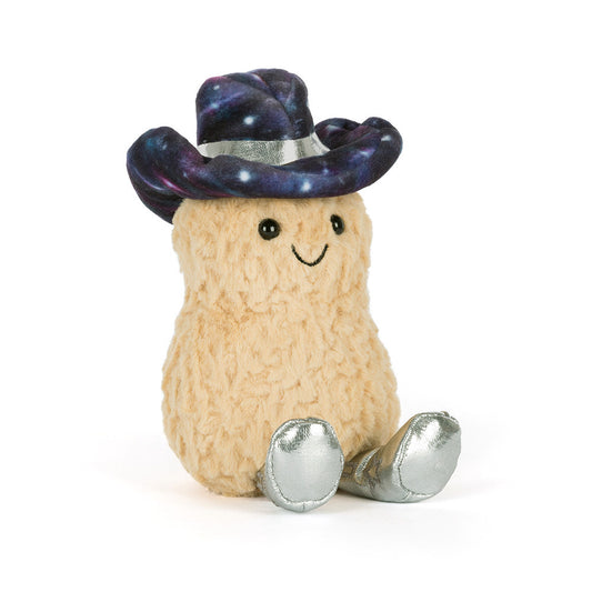 Stuffed toy peanut with a smiling face, a galaxy-patterned hat and silver shoes on a white background