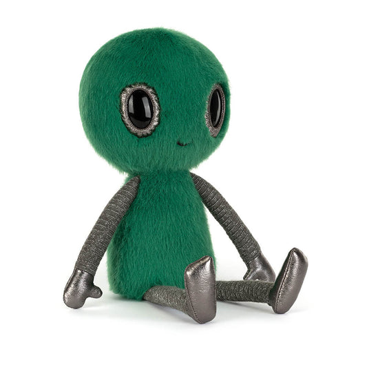 Soft toy of a green alien with large black eyes against a white background.