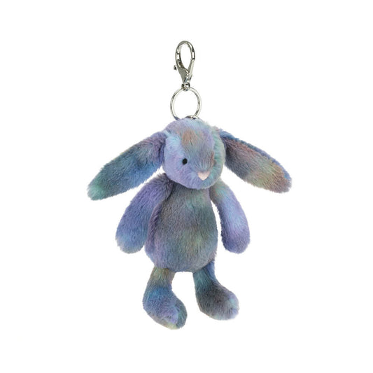 Plush bunny keychain with pastel space inspired colours on a white background.