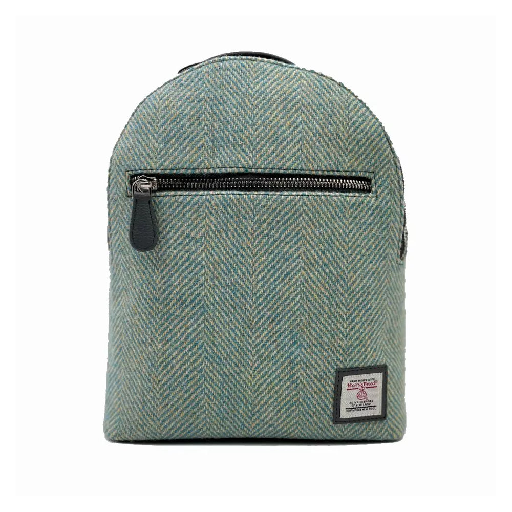 Harris tweed backpack with a turquoise herringbone pattern. 
