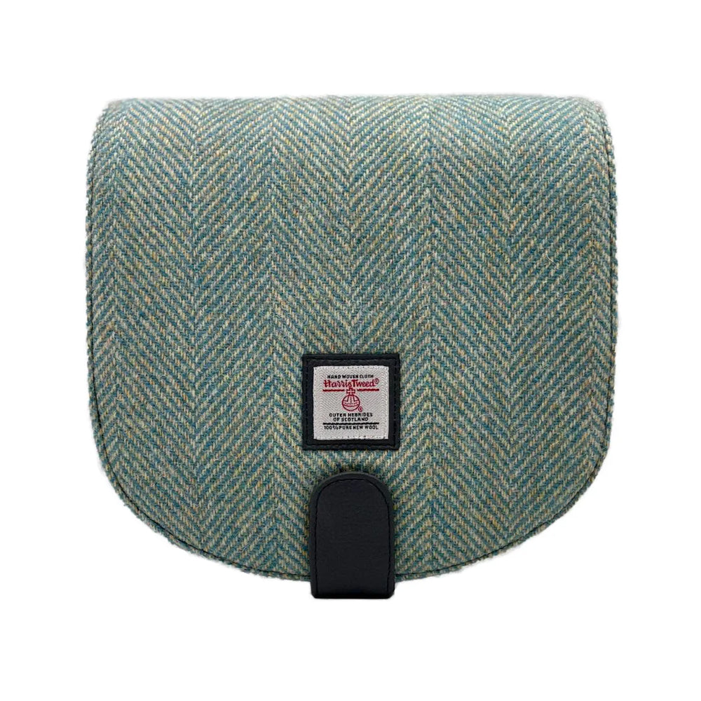 Turquoise herringbone Harris tweed bag with grey vegan leather detailing.