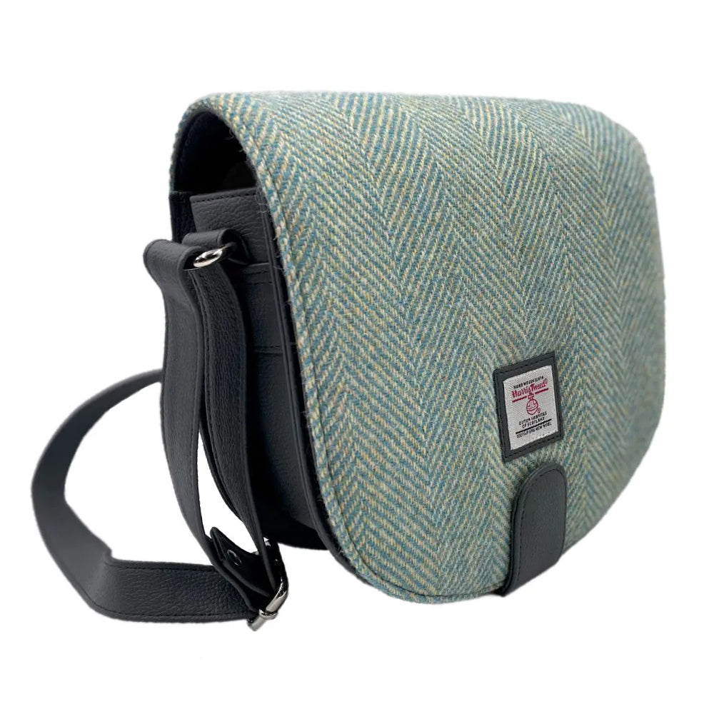 Turquoise herringbone Harris tweed bag with grey vegan leather detailing.