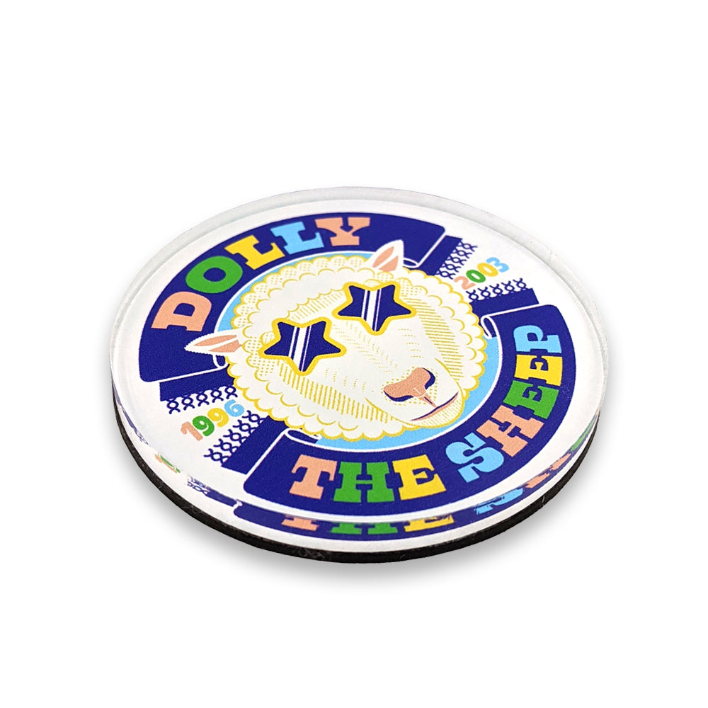 A round acrylic magnet with a colourful illustration of Dolly the sheep against a plain white background.