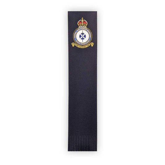 A navy blue leather bookmark with the East Fortune Royal Air Force badge at the top. A sword lays over a Saltire flag which sits in the centre of a round crest topped by a royal crown.