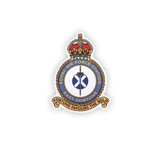 A wooden cut out magnet of the east fortune Royal Air Force badge. A sword lays over a Saltire flag which sits in the centre of a round crest topped by a royal crown.