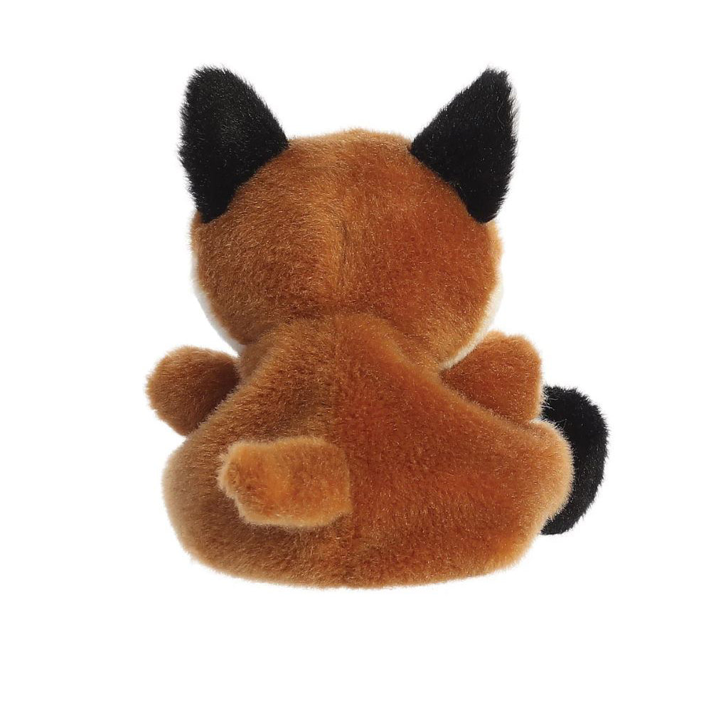 A reverse view of a small orange and white soft toy fox with black beaded eyes sitting against a plain white background.