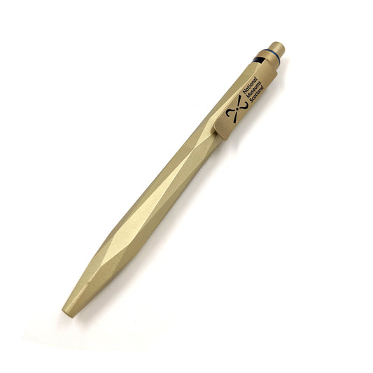A gold pen with a smooth edged angular design and the National Museum of Scotland logo on the clip.