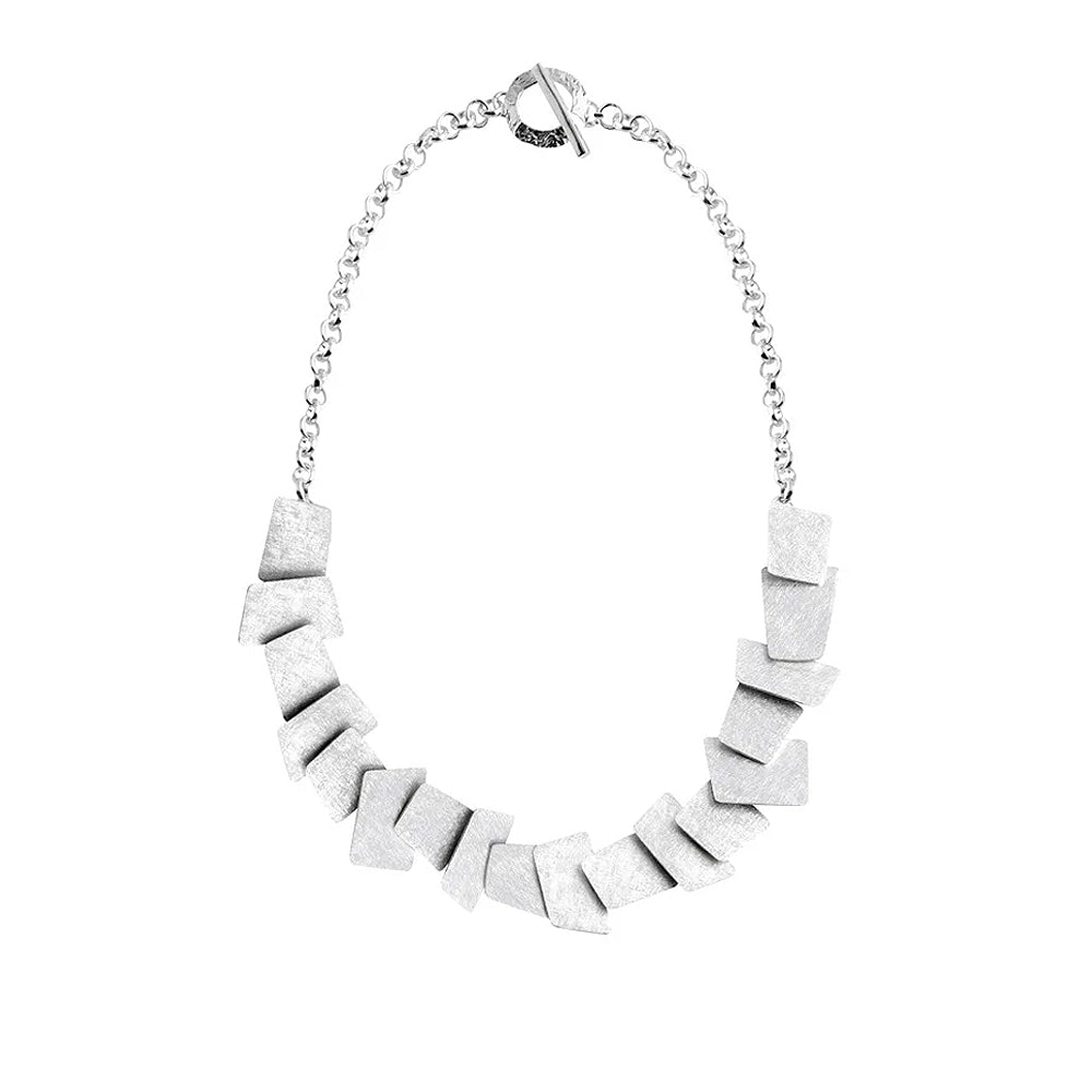 Silver necklace with textured geometric detailing.