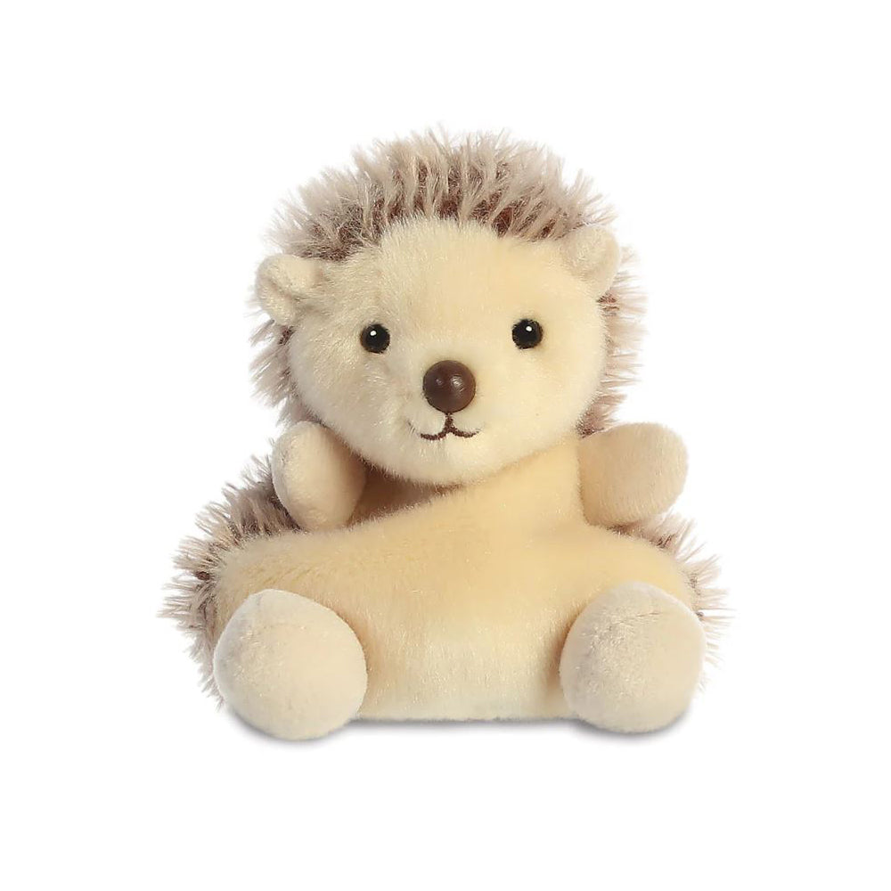 A small brown hedgehog soft toy with black beaded eyes and a brown plastic nose sitting against a plain white background.