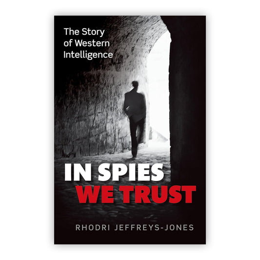 Book cover with a black and white silhouetted figure from behind walking out into the light from a dark alleyway. The books title overlays in large bold white and red text.