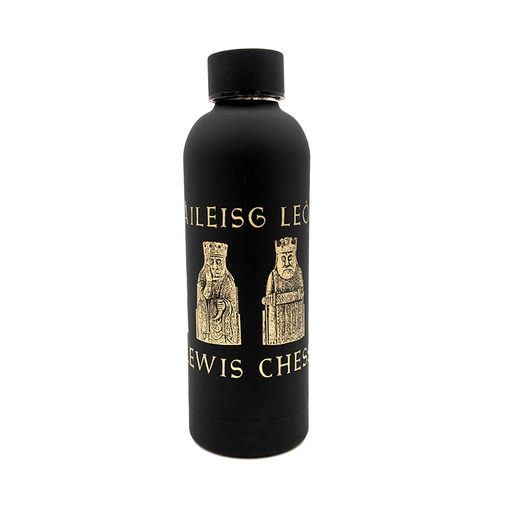 A black hot and cold water bottle printed with illustrations of the six Lewis chess pieces, below the pieces are the words "The Lewis Chessmen" and above are the words translated into Gaelic "Fir- Taileisg Leodhais". The printing is in a metallic bronze.