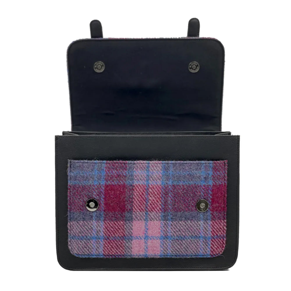 Pink checked Harris tweed messenger back with black vegan leather detailing.
