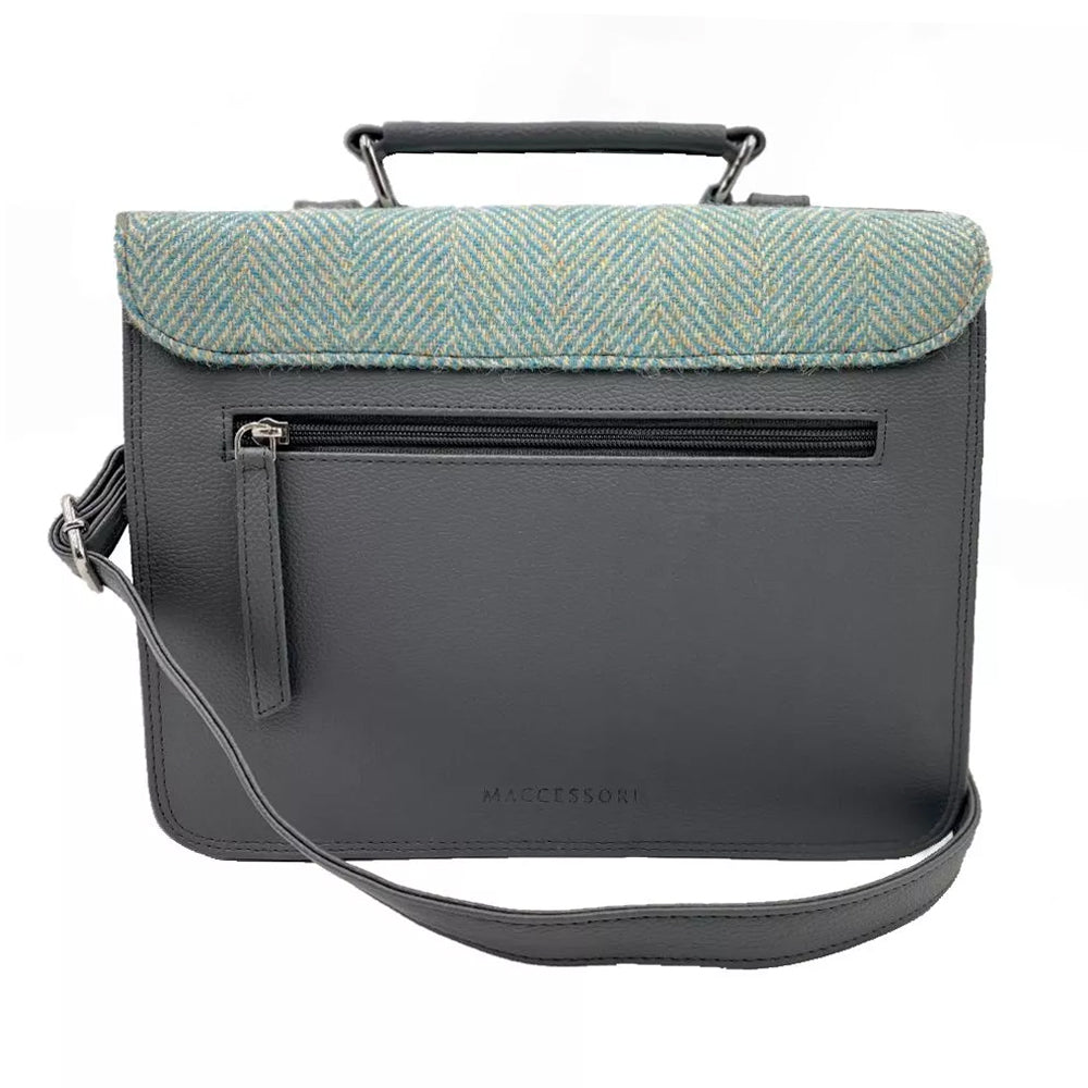Turquoise herringbone Harris tweed messenger back with grey vegan leather detailing.
