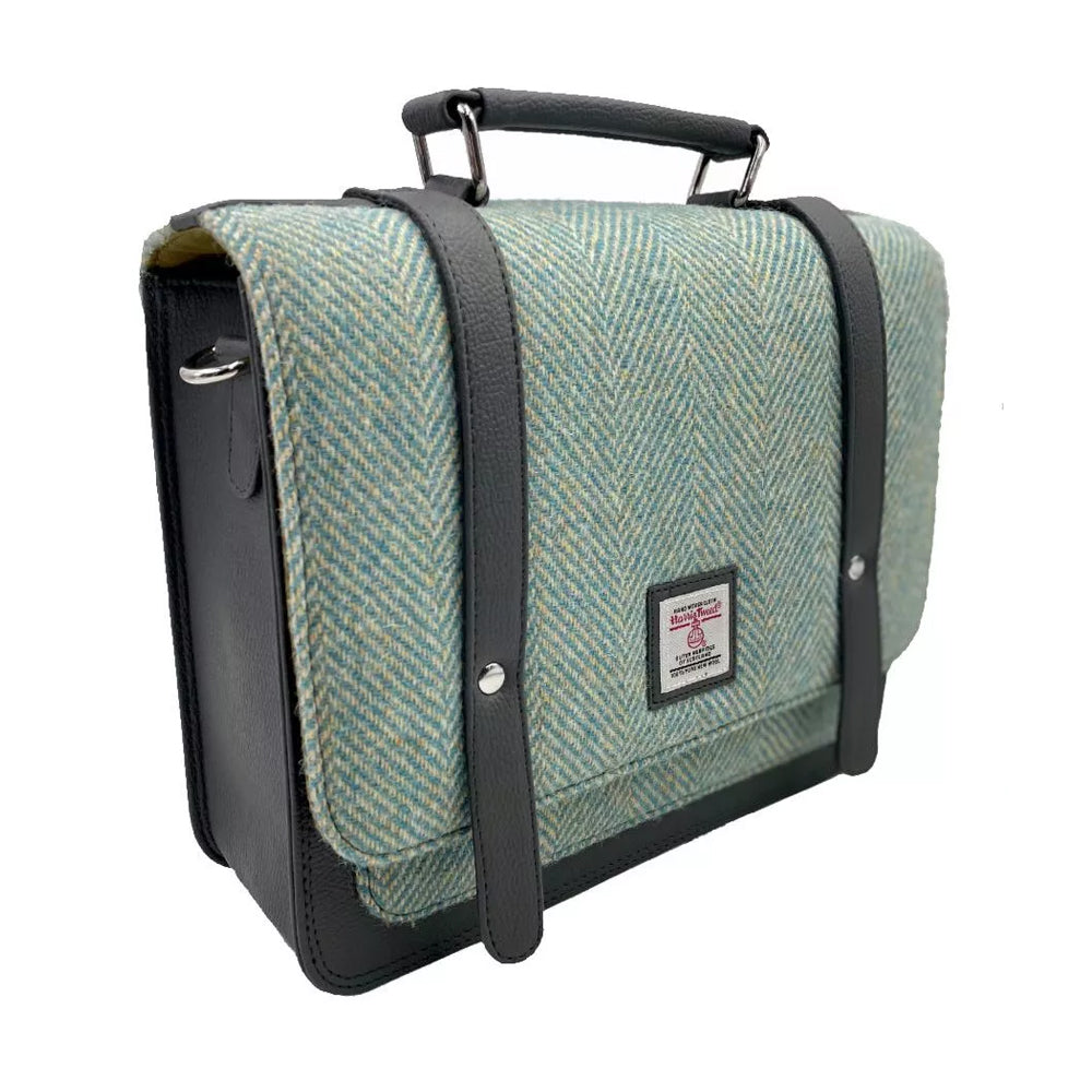 Turquoise herringbone Harris tweed messenger back with grey vegan leather detailing.