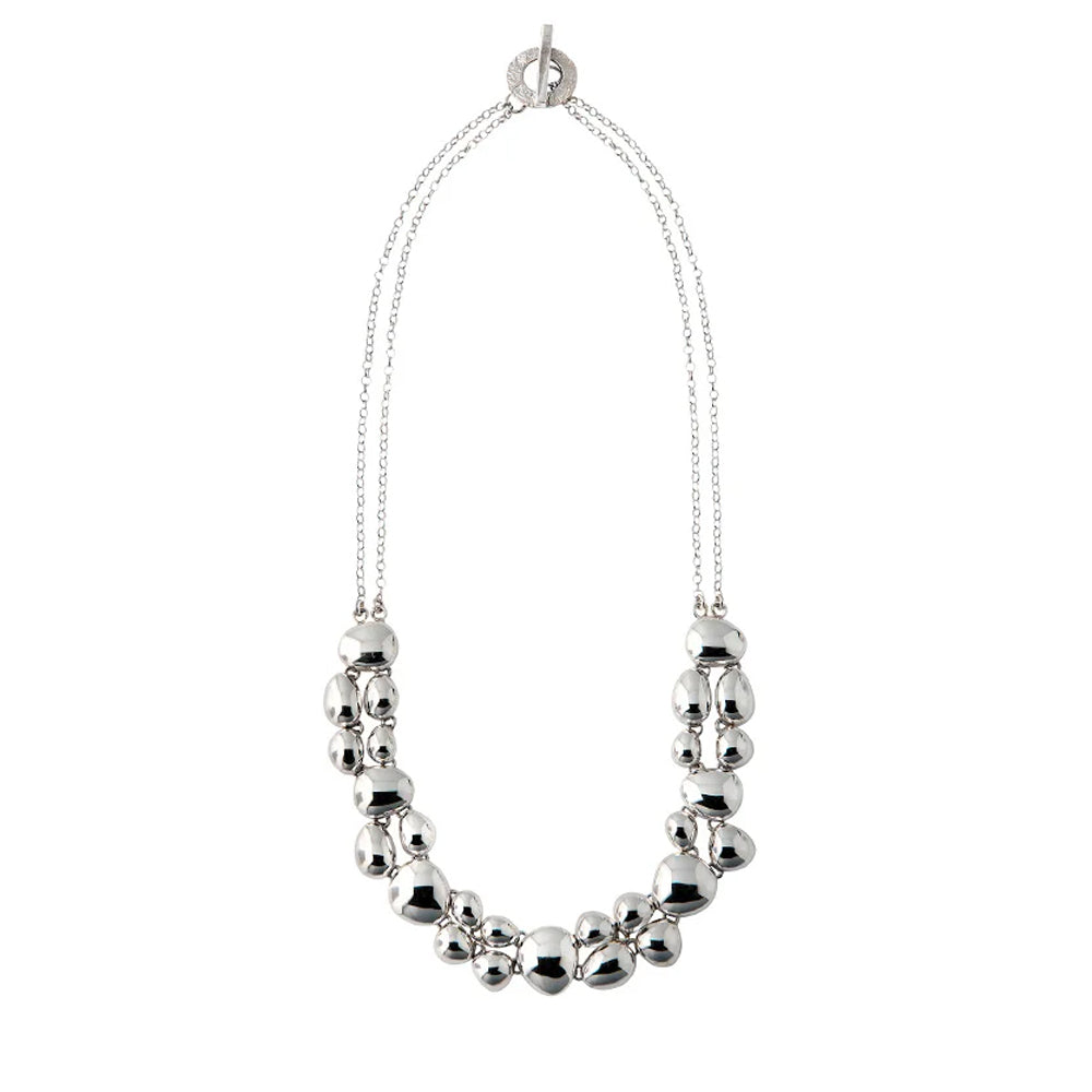 Silver necklace with a double chain and polished pebble like detailing.