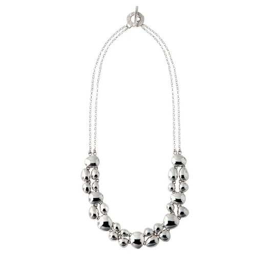 Silver necklace with a double chain and polished pebble like detailing.