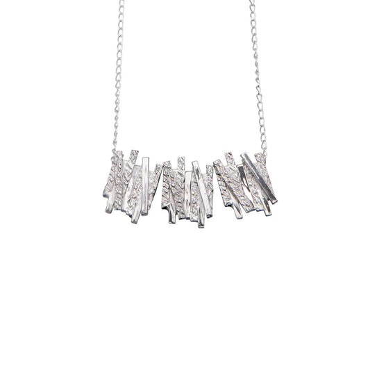 Silver Pendant with geometric overlapping line detailing.