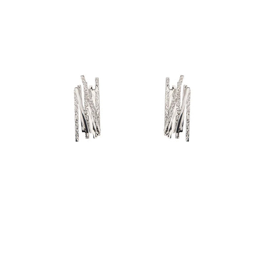 Silver earrings with geometric overlapping line detailing.