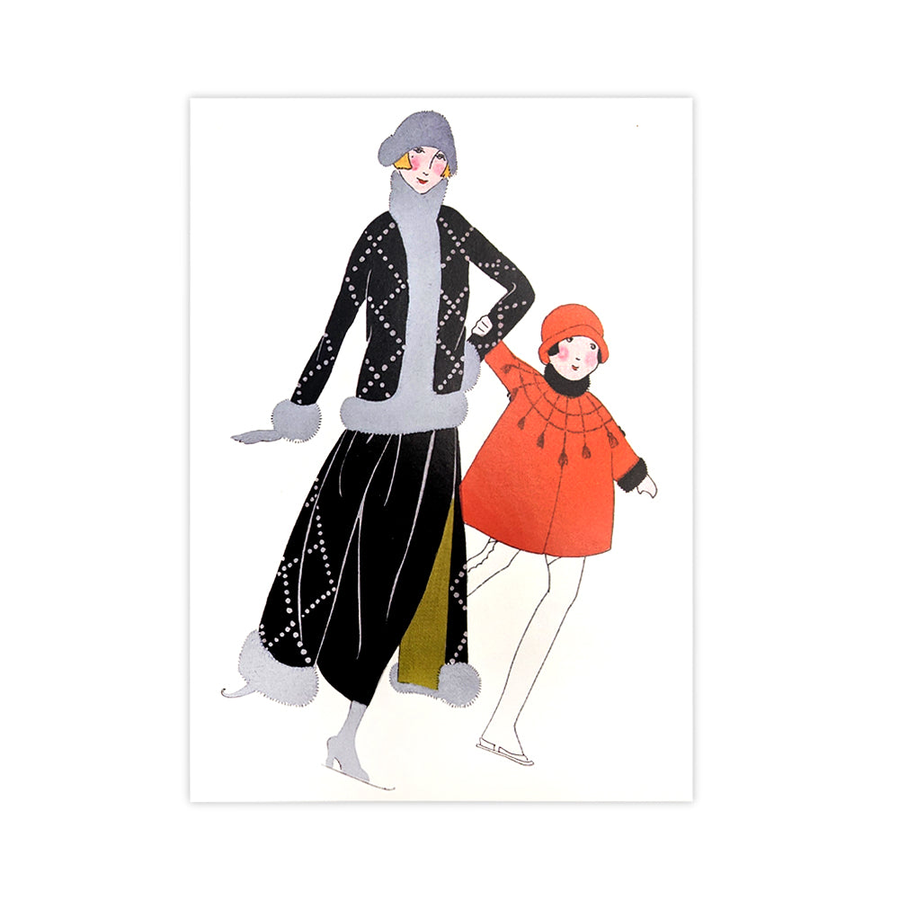 A Christmas card with an illustration of a mother and daughter ice skating from a magazine in 1922. The mother is wearing a black patterned coat with grey fur lining, the daughter is wearing a red hat and poncho with white tights.
