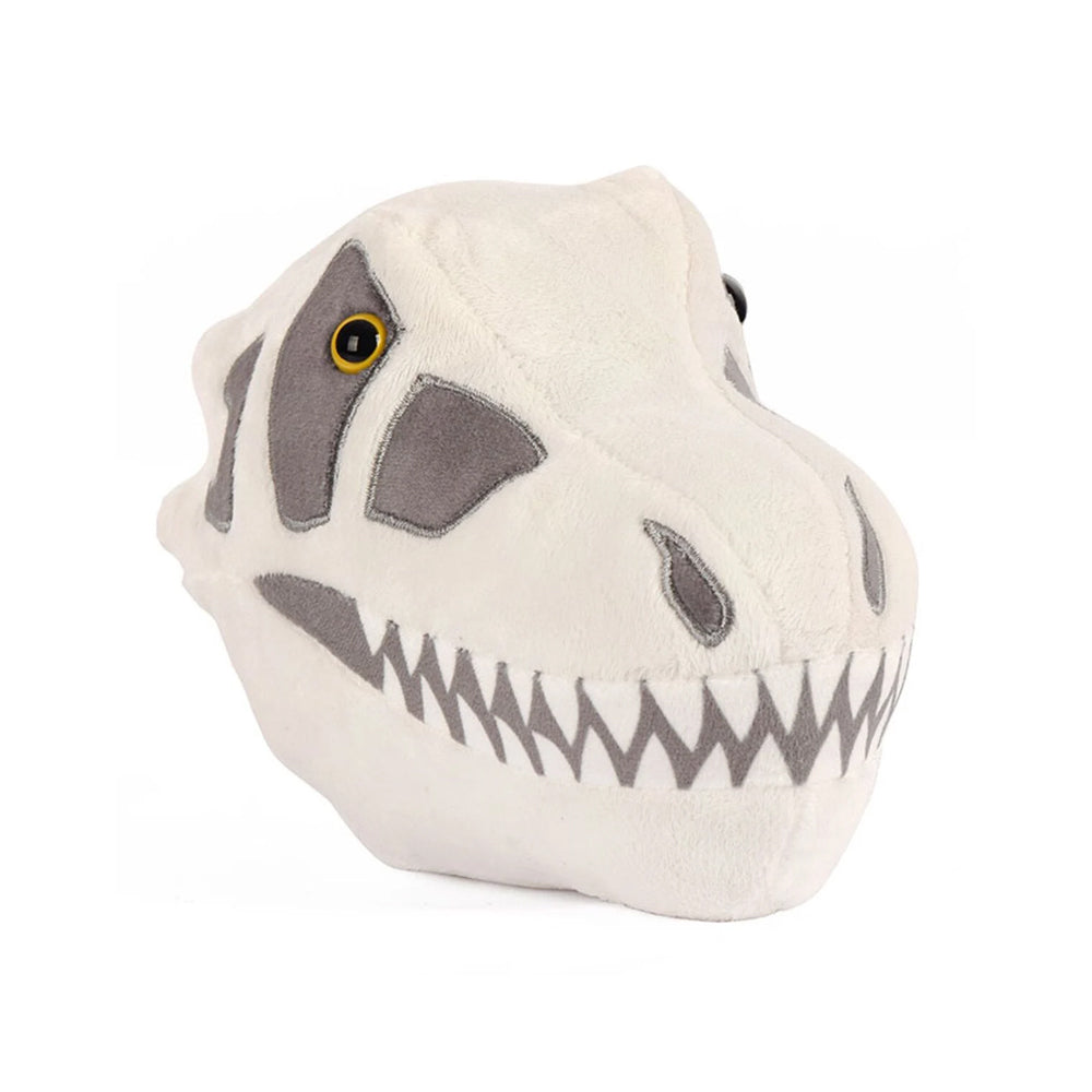 A plush soft toy of a t-rex skull against a plain white background
