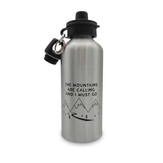 A silver stainless steel water bottle with a black cap against a plain white background. The bottle is printed in black with the words "The mountains are calling and I must go" with a simple line drawing of some mountains underneath.