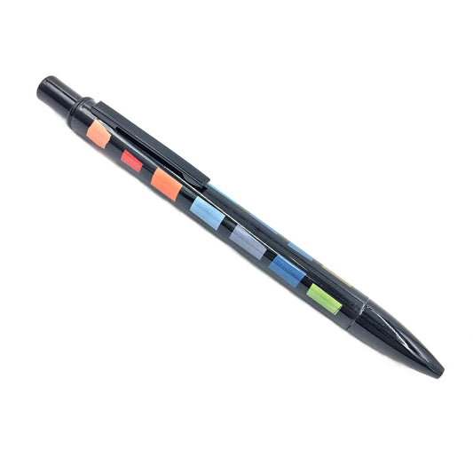A black pen with Bernat Klein's colourful rectangular swatches along the body against a white background.