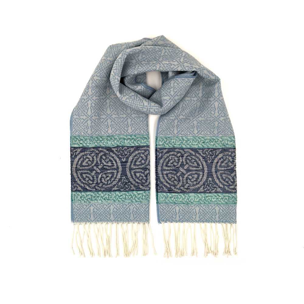 Pale blue tassled scarf with a celtic roundal pattern against a plain white background.