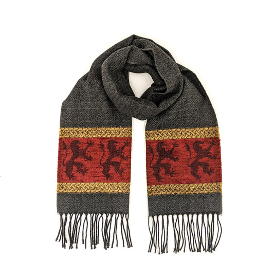 Dark grey and red tassled scarf with a celtic knot and lion pattern against a plain white background.