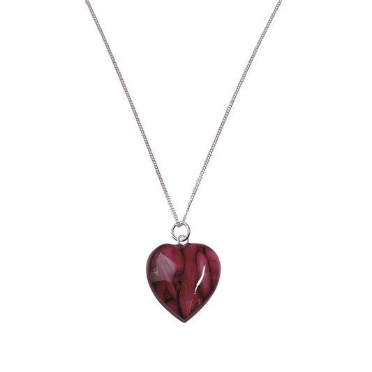 A purple heart pendant on a silver chain against a plain white background.