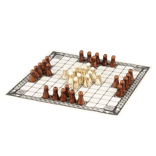 A square cloth game board with a grid pattern bordered by Norse knot work. A diamond of white game pieces resembling viking warriors sit in the middle surrounding a larger king piece, triangles of black pieces that also resemble warriors face inwards from each edge.