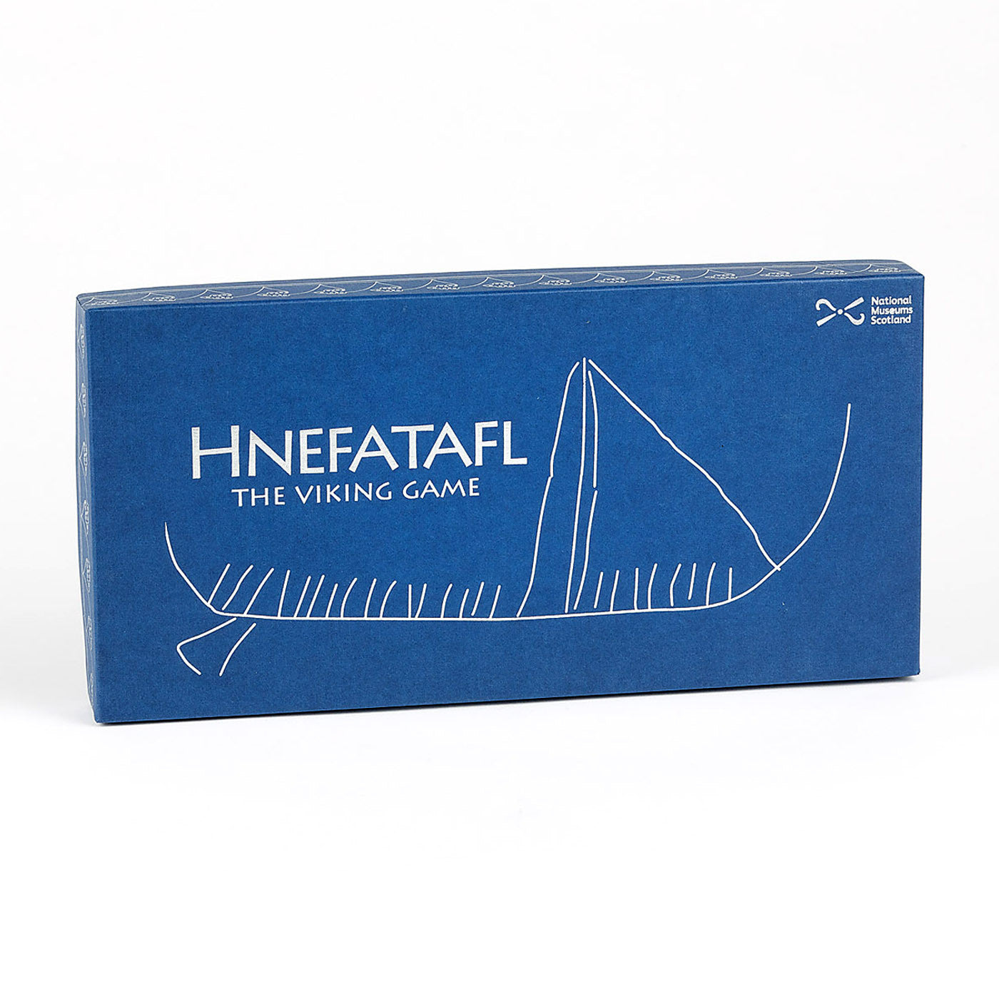 A navy blue box with the word "Hnefetafl" and an old carving of a viking long ship embossed in metallic silver, the National Museums Scotland logo is also embossed in the top right corner.