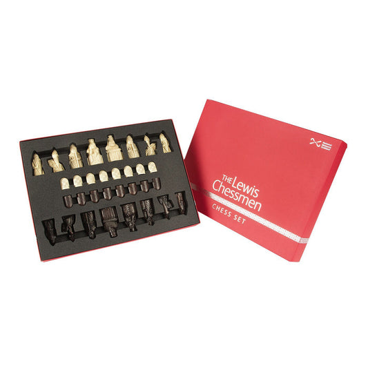 A Lewis chess set box and lid. On the left a red box with a black foam insert which organises each piece of the set in a uniform manner. To the right there is a red lid with the words "The Lewis Chessmen" a row of knot work designs and the words "Chess Set" embossed in a shiny silver along the bottom edge. The National Museums Scotland logo is also embossed in this silver at the top right corner.