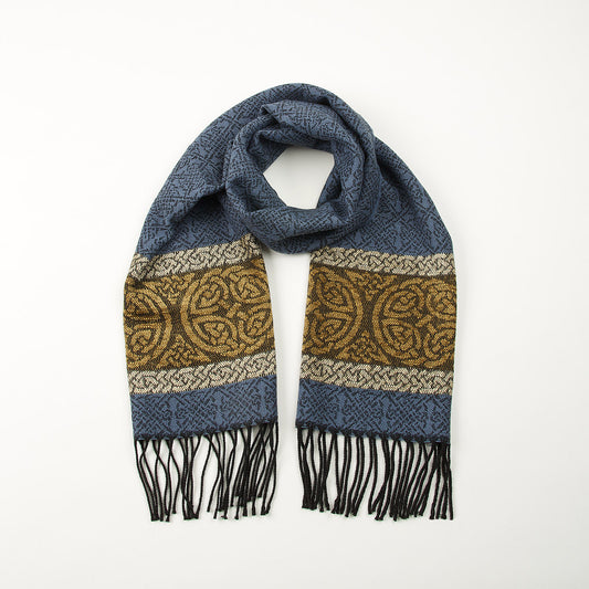 Blue tassled scarf with a celtic roundal pattern against a plain white background.