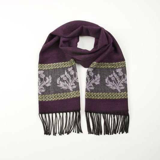 Purple tassled scarf with a celtic roundal and thistle pattern against a plain white background.