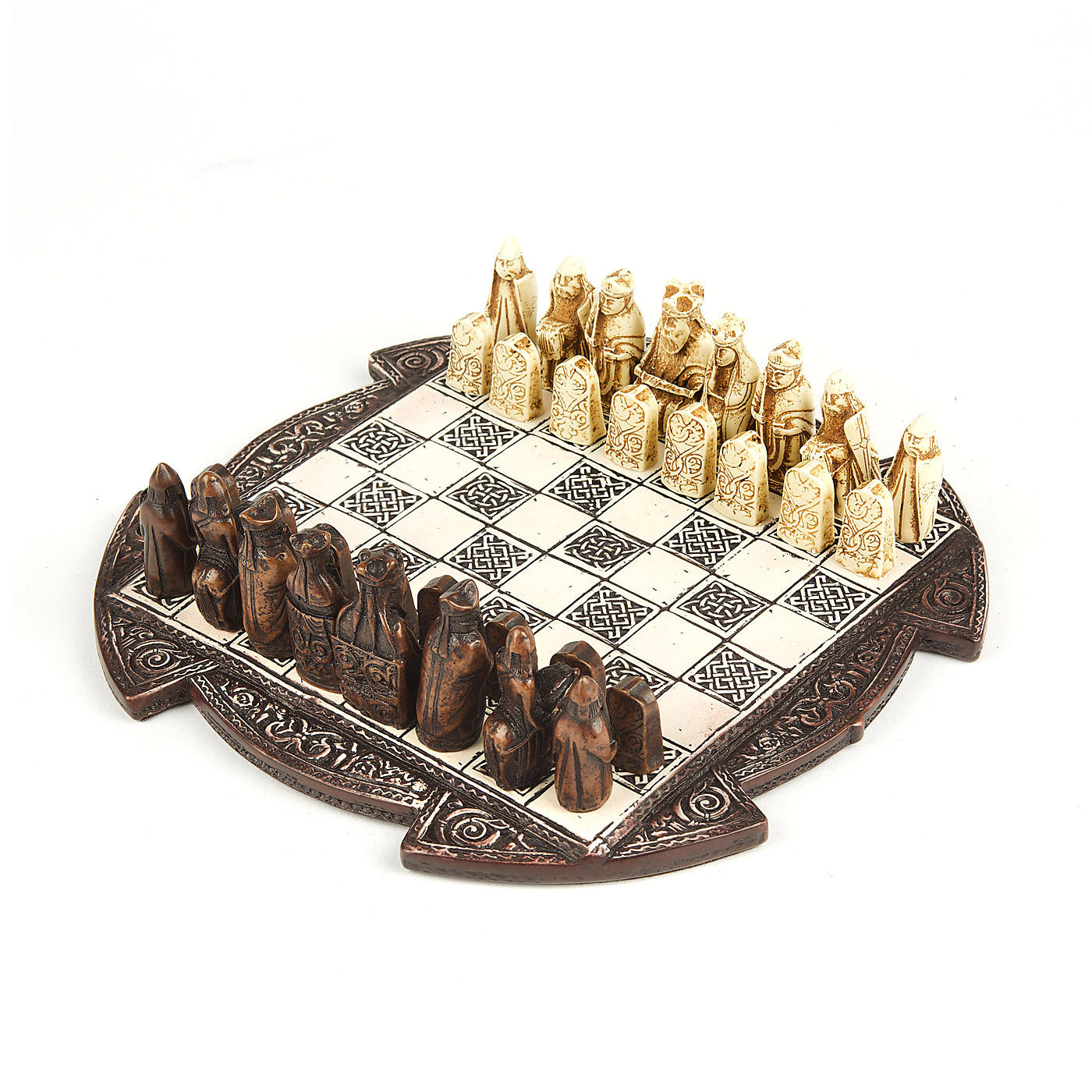 A round brown resin box lid with a chess board incorporated. It is decorated around the edge and on the board squares with knot work patterns. A game is set up on the board of a set of brown and a set of white Lewis chess pieces.