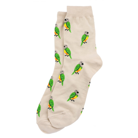 A pair of beige socks with a repeating pattern of green and yellow parrots.