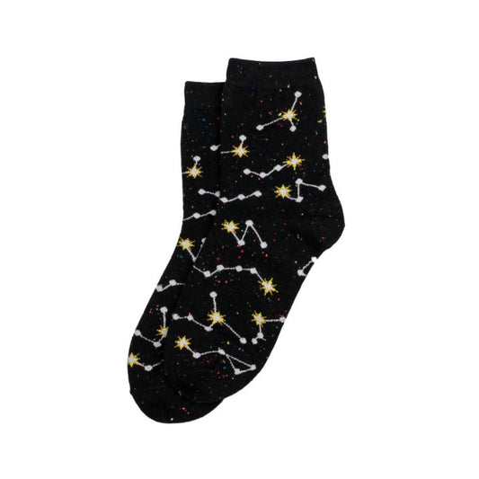 A pair of black socks with a constellation design against a plain white background.