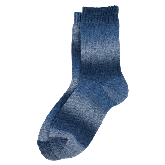 A pair of socks with a varying blue gradient pattern against a plain white background.
