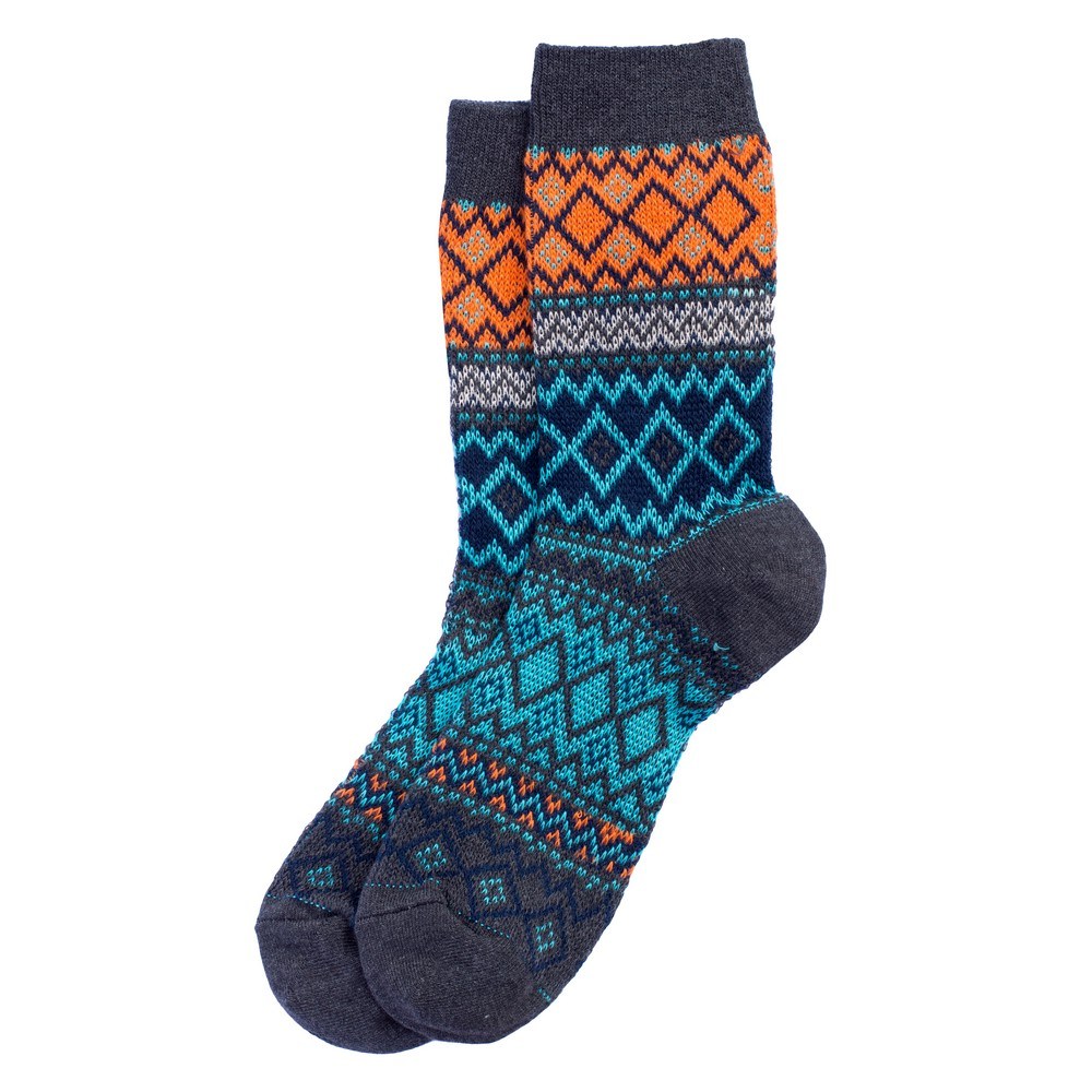 A pair of socks with a blue and orange fair isle like pattern against a white background.