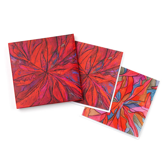 A box, and two cards with the Bernat Klein painting "Lanzarote" sat against a plain white background. The painting is a bright floral design in reds and blues.