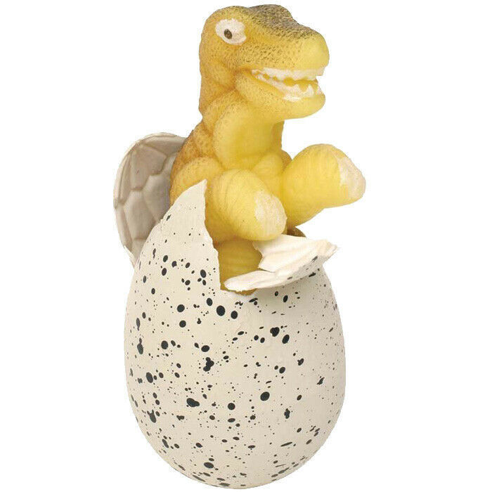 A small yellow dinosaur hatching out of an egg with black speckles.